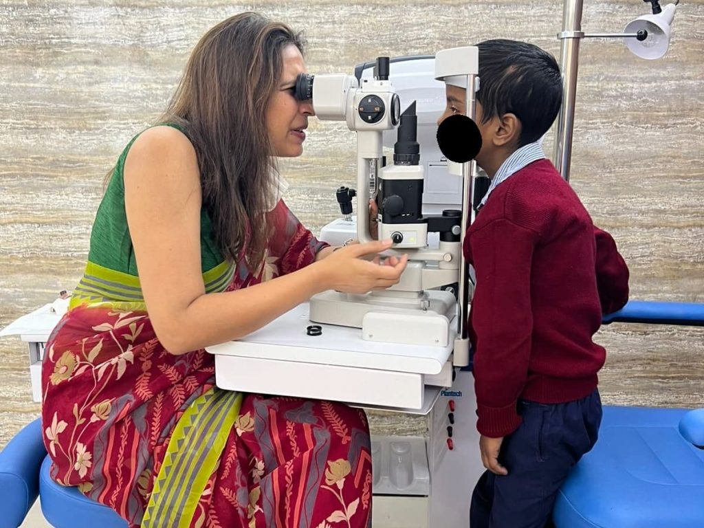 Children feel safe and happy during a comprehensive eye examination with Dr Shibal Bhartiya in Gurgaon. She talks to children as she examines their eyes, explaining what is happening